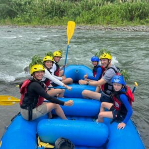 Family on a private whitewater rafting tour on the Pacuare River in Costa Rica