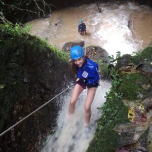 Teenage girl canyoning in Turrialba, Costa Rica