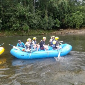 Family whitewater rafting in Sarapiqui in Costa Rica