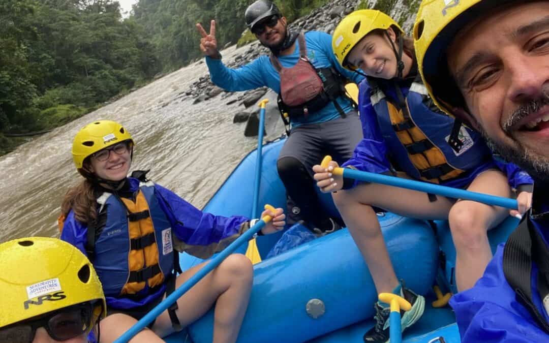 A family whitewater rafting on the Pacuare River in Costa Rica