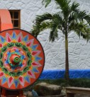 a brightly colored oxcart wheel outside a workshop in the artisan town of Sarchi in costa rica