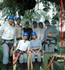 a corporate group treeclimbing on a teambuilding retreat in Costa Rica