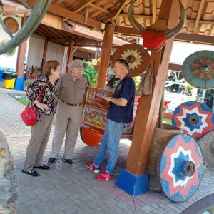 Senior travelers in Sarchi visiting a Costa Rican oxcart workshop