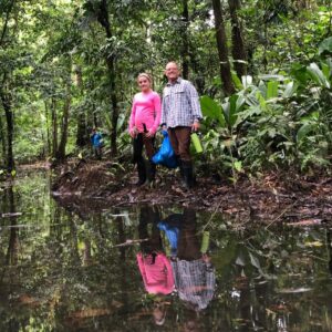 Father and daughter hiking in the rainforest in Costa Rica