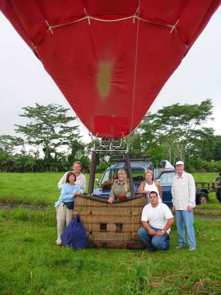 Tucker Comstock in a hot air balloon basket with Serendipity Adventures clients in Costa Ric